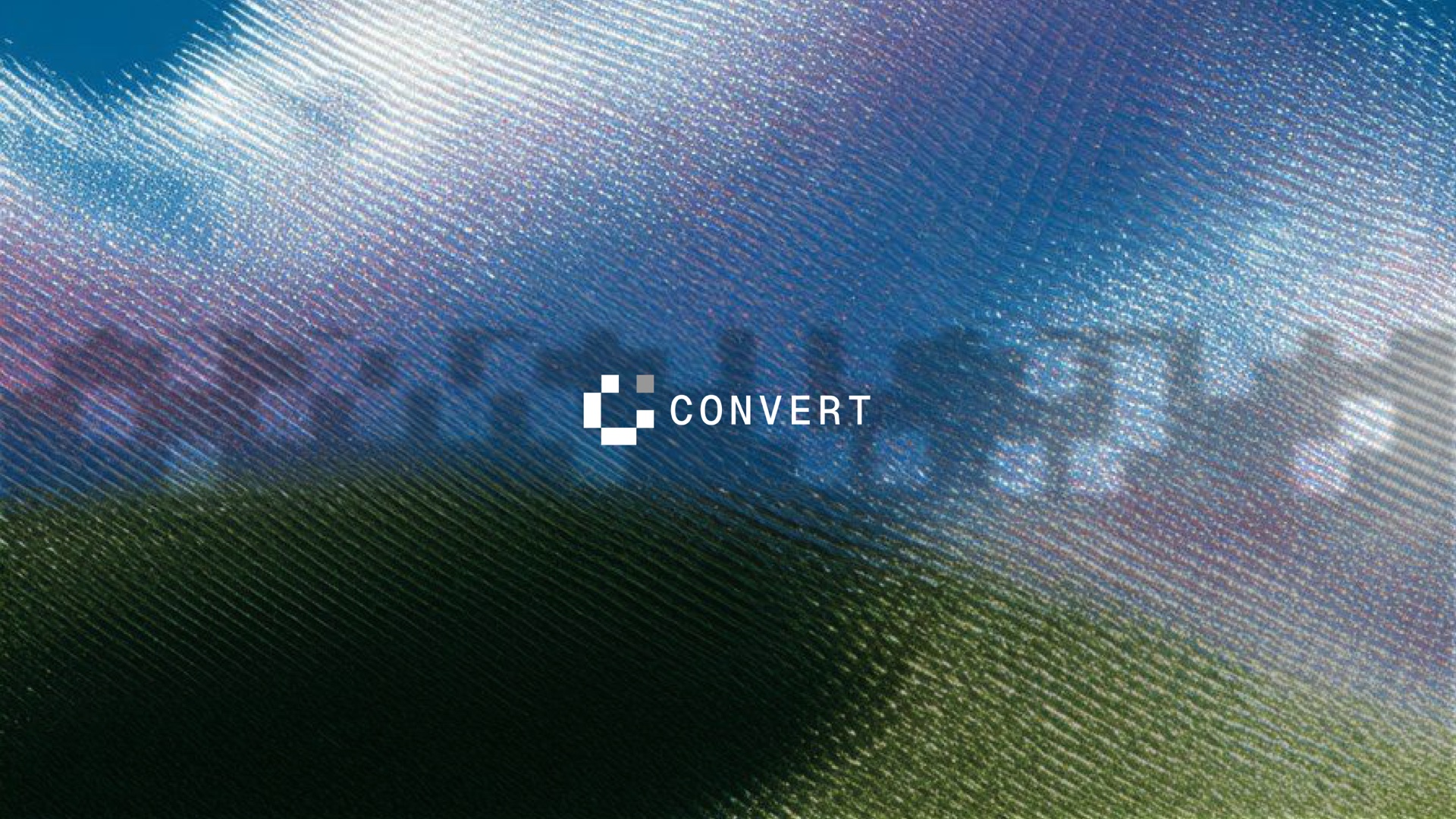 Convert logo over a blue and green textured landscape