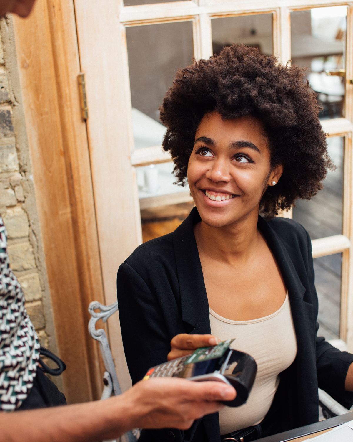 African customer completing a secure card payment